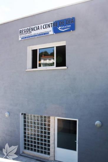 COM A CASA